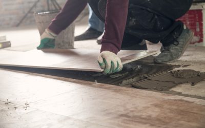 Laying floor ceramic tile. Renovating the floor Laying floor ceramic tile. Renovating the floor
